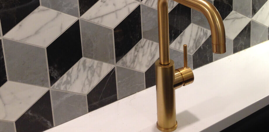 Art Deco Backsplash Bronze Fixtures