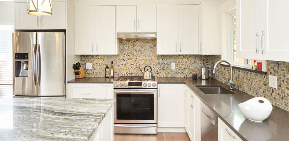 close up shot of custom white shaker cabinetry in burnaby kitchen modernization