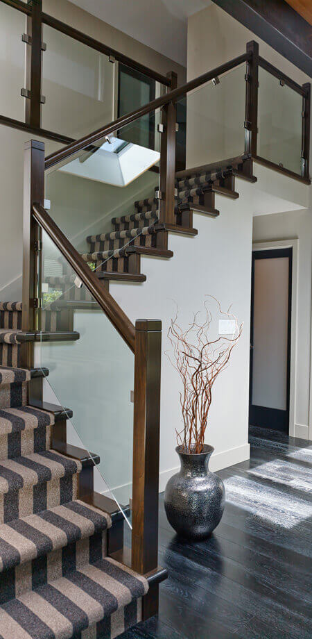 Burnaby lynndale renovation entrance stairwell contrast striped stair runner