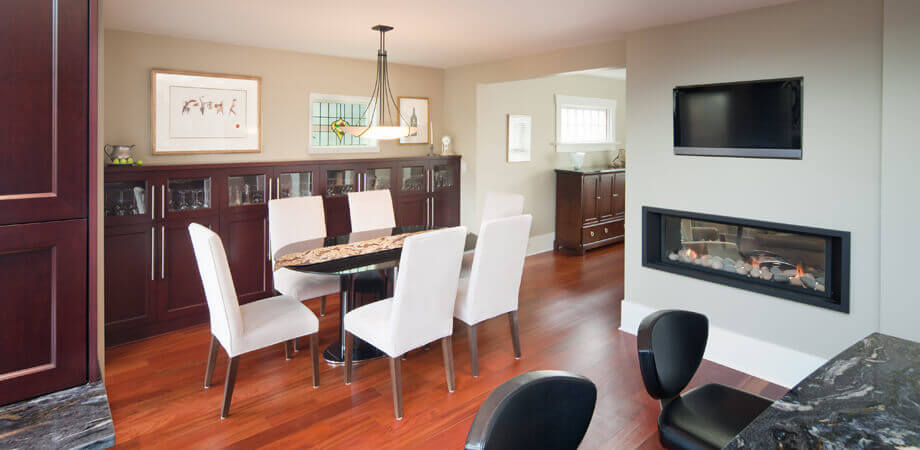 dining area for entertaining dinner parties in this renovated custom cherry wood kitchen