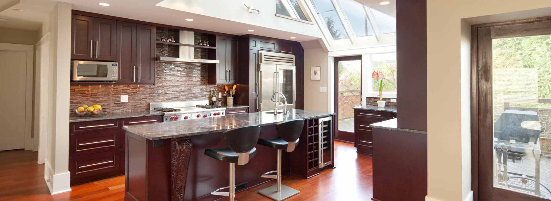 Vaulted Kitchen Ceiling Makes Rich Dark Cabinetry Pop