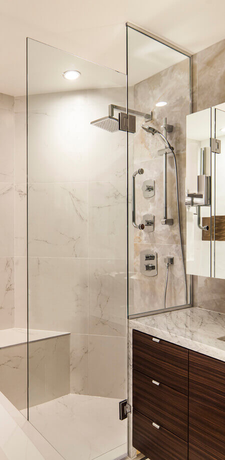 Detail of multi function standing shower hand wand and rain head - luxury shower in North Vancouver