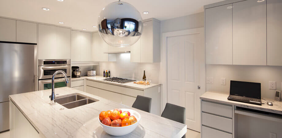 roomy 9 foot cantilevered kitchen island topped with glamorous granite in north vancouver kitchen update