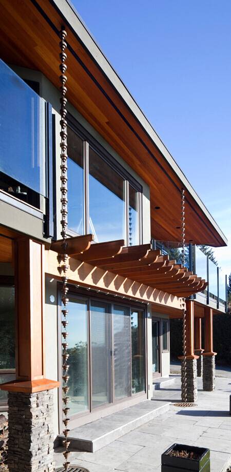 copper rain chains add element of fun to function west Vancouver exterior renovation
